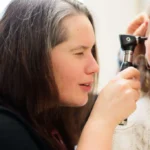 doctor providing ear exam