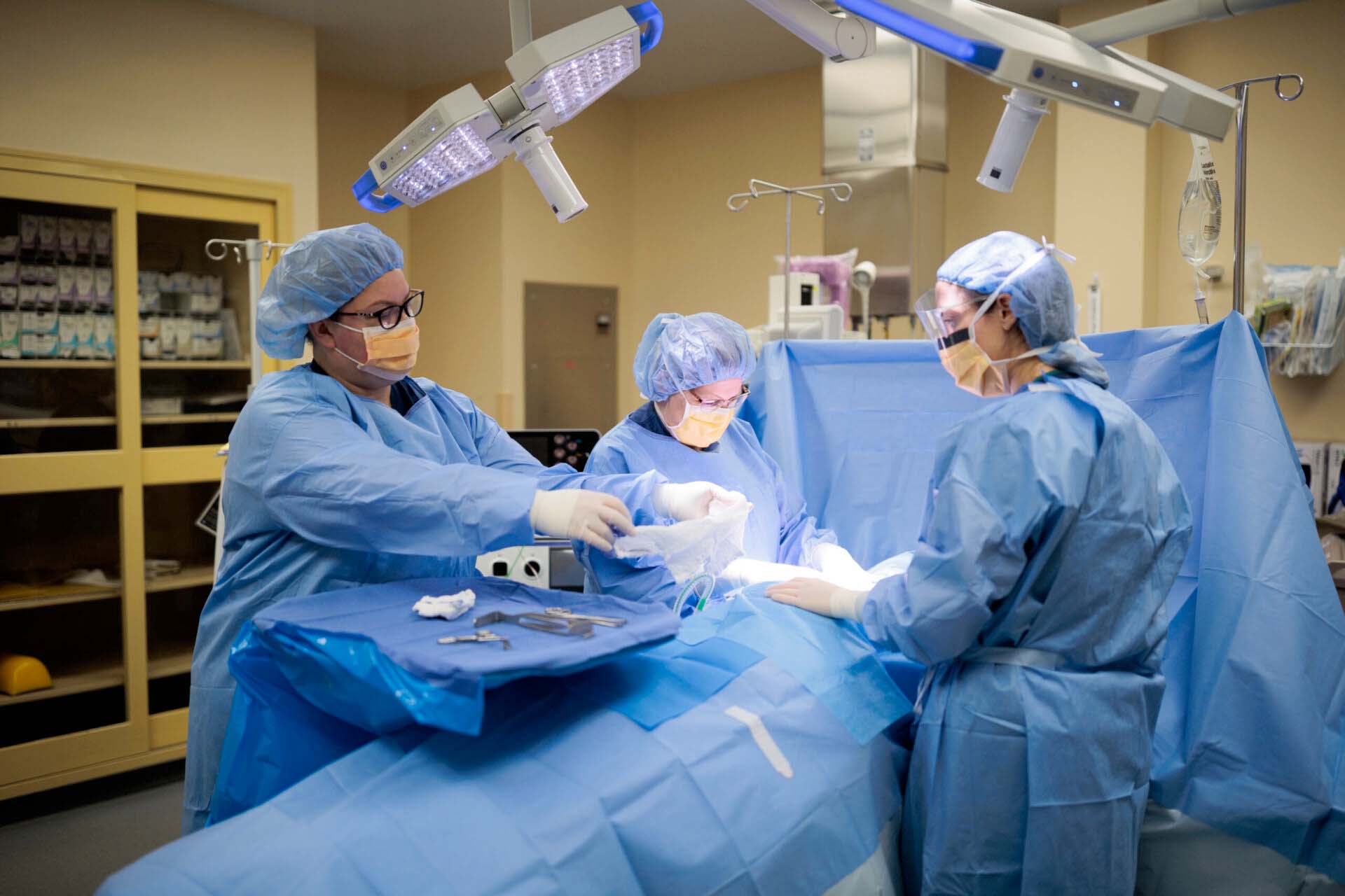 medical professionals performing surgery